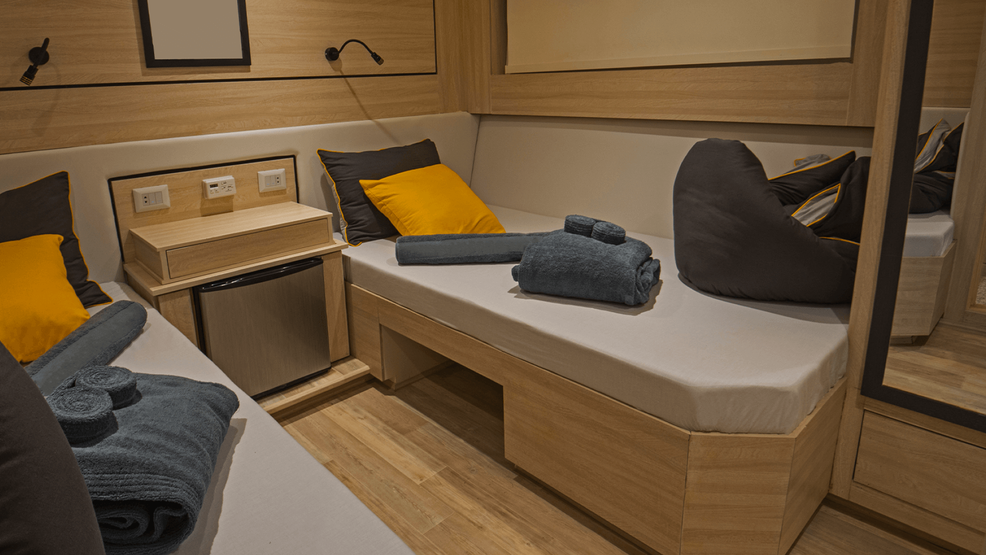 Compact offshore living quarters with beds, storage, and lighting for worker comfort at sea. Platforms, oil rigs, and vessels